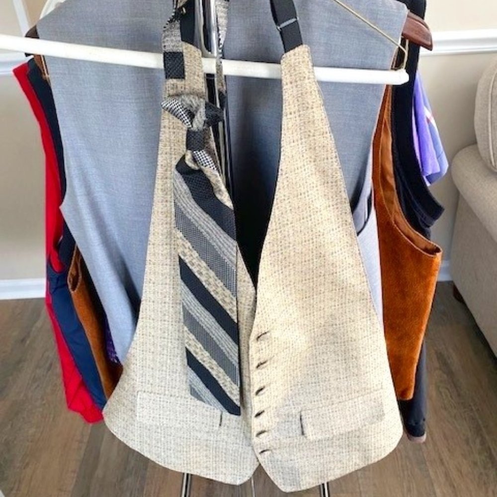 Mel Howard	Mens tan tux vest & tan & black tie